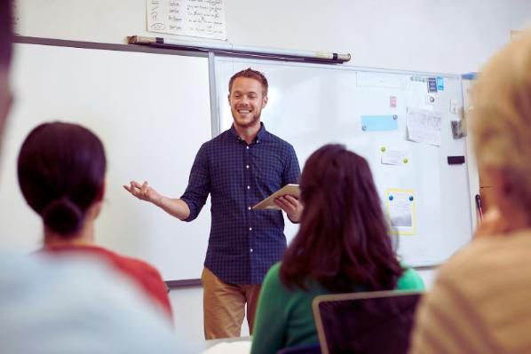 a teacher teaching in a classroom